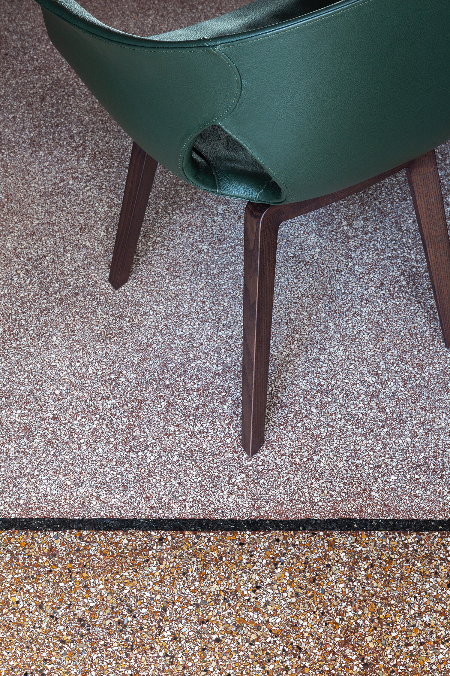 Modern Curved Brown Leather Armchair with Solid Dark Wood Legs Ergonomic Lounge Seat