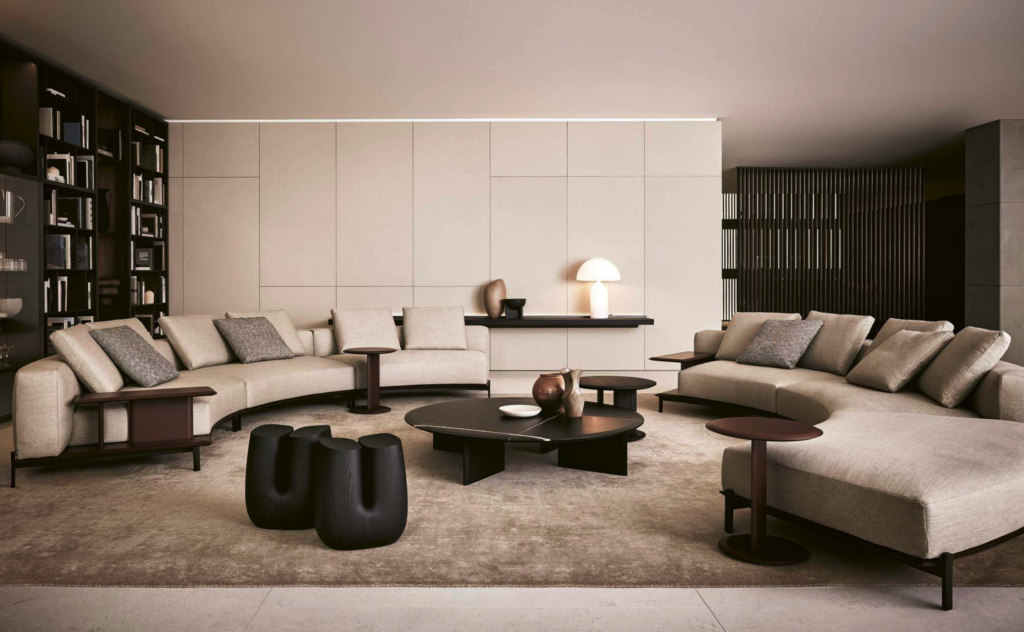 Sculptural Curved Sofa with Leather-Wrapped Base and Contrast Stitch Detailing