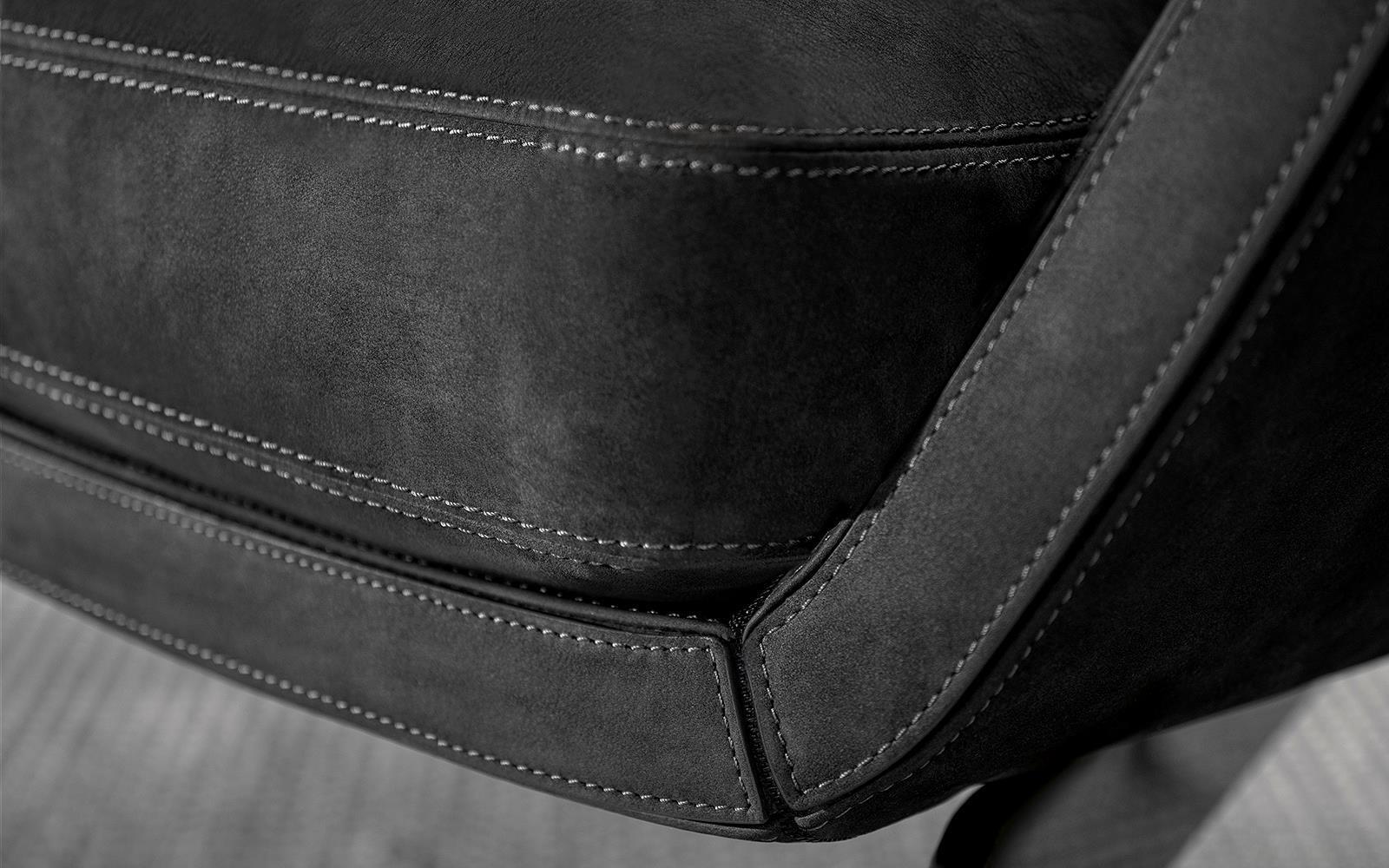 Curved Backrest Armchair with Signature Leather Strap and Anti-Fingerprint Finish