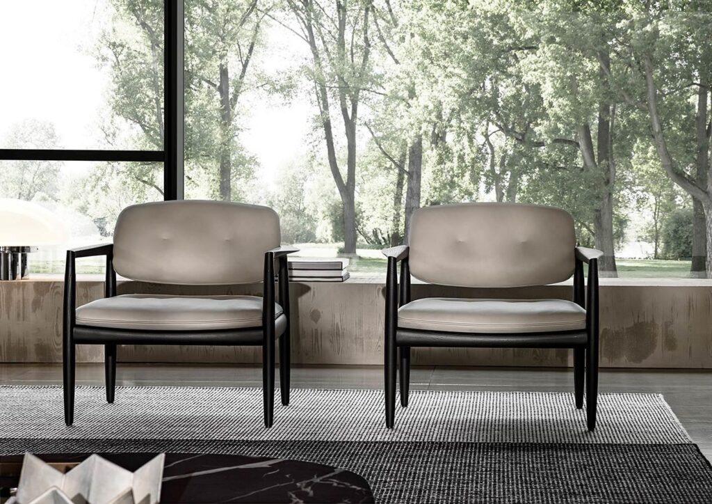 Sculpted Walnut Frame and Plush Channeled Cushioning Armchair with Footrest