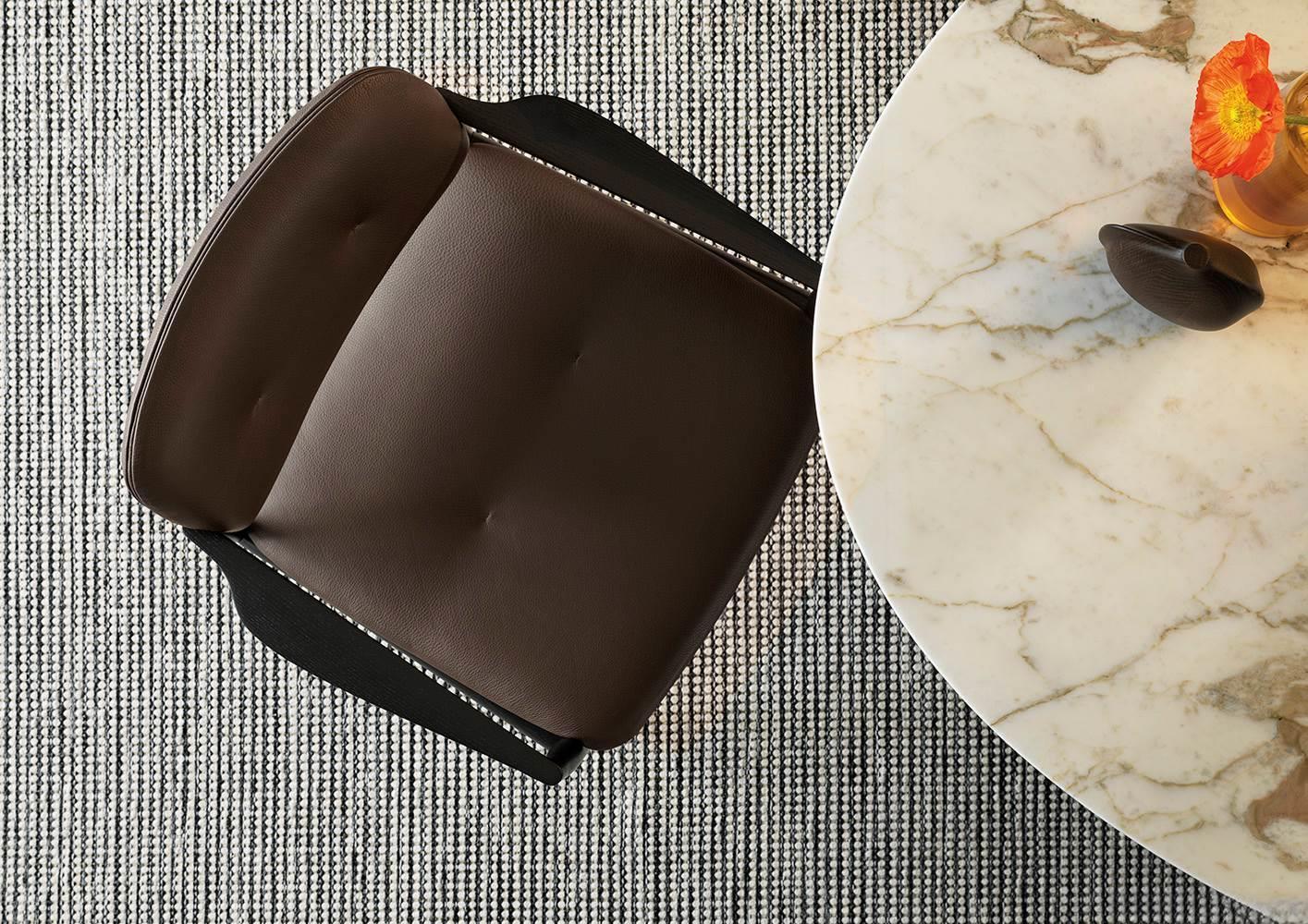 Sculpted Walnut Frame and Plush Channeled Cushioning Armchair with Footrest