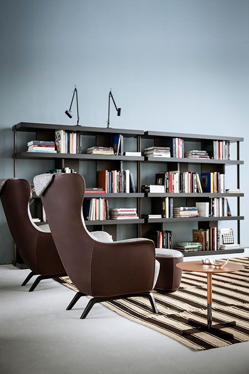 Blue Lounge Chair with Solid Wood Base Premium Leather Upholstery and Adjustable Headrest