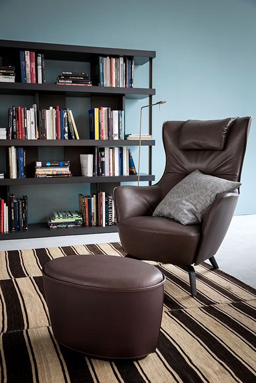 Blue Lounge Chair with Solid Wood Base Premium Leather Upholstery and Adjustable Headrest