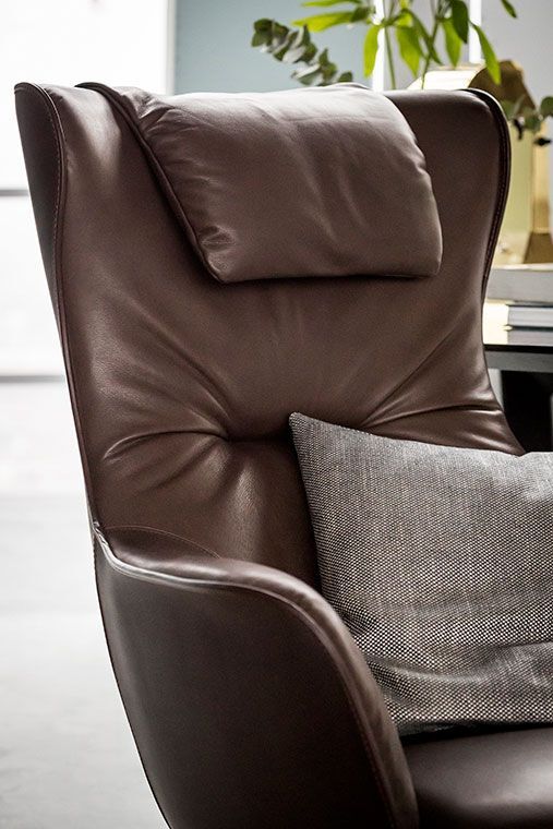 Blue Lounge Chair with Solid Wood Base Premium Leather Upholstery and Adjustable Headrest