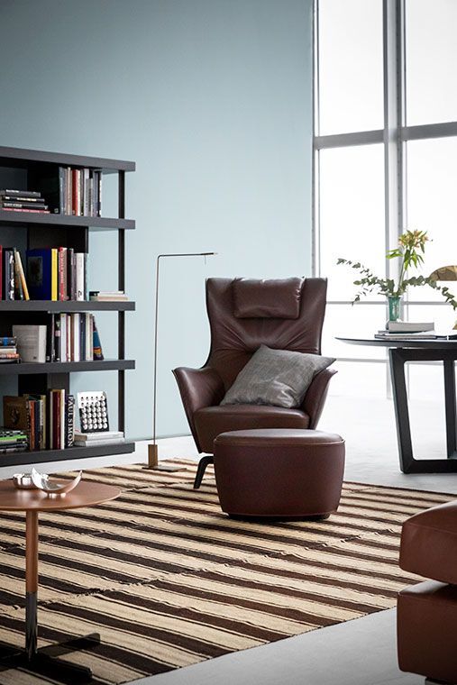 Blue Lounge Chair with Solid Wood Base Premium Leather Upholstery and Adjustable Headrest