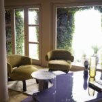 Olive Green Curved Back Suede Accent Chair with Black Wooden Legs