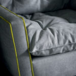 Light Gray Modern Swivel Armchair with Tufted Cushion & Decorative Stitching