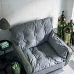 Light Gray Modern Swivel Armchair with Tufted Cushion & Decorative Stitching
