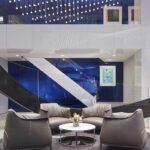 Armchair Upholstered in Brown Leather with Steel Frame in Gunmetal Grey Finish