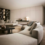 Sculptural Curved Sofa with Leather-Wrapped Base and Contrast Stitch Detailing