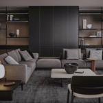 Sculptural Curved Sofa with Leather-Wrapped Base and Contrast Stitch Detailing