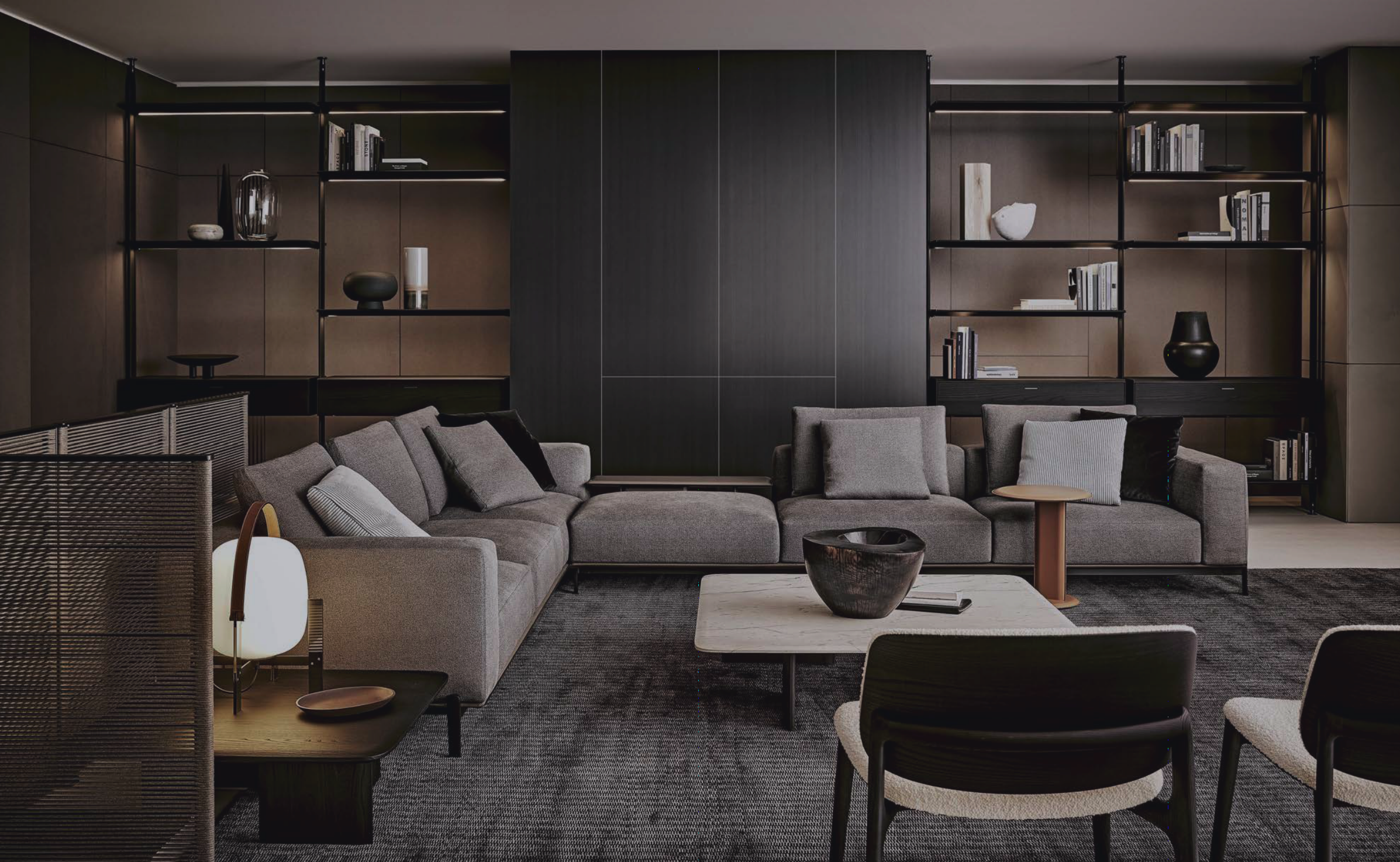 Sculptural Curved Sofa with Leather-Wrapped Base and Contrast Stitch Detailing