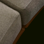 Sculptural Curved Sofa with Leather-Wrapped Base and Contrast Stitch Detailing