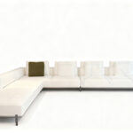 Sculptural Curved Sofa with Leather-Wrapped Base and Contrast Stitch Detailing