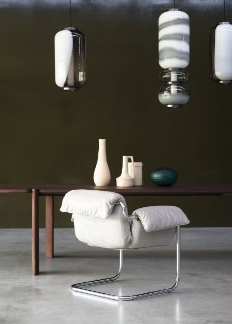 Light Gray Leather Accent Chair with Curved Chrome Metal Frame