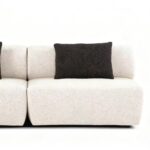 Flowing Modular Sofa with Ergonomic Support and Continuous Decorative Stitch
