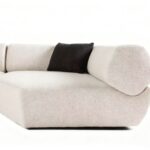 Flowing Modular Sofa with Ergonomic Support and Continuous Decorative Stitch