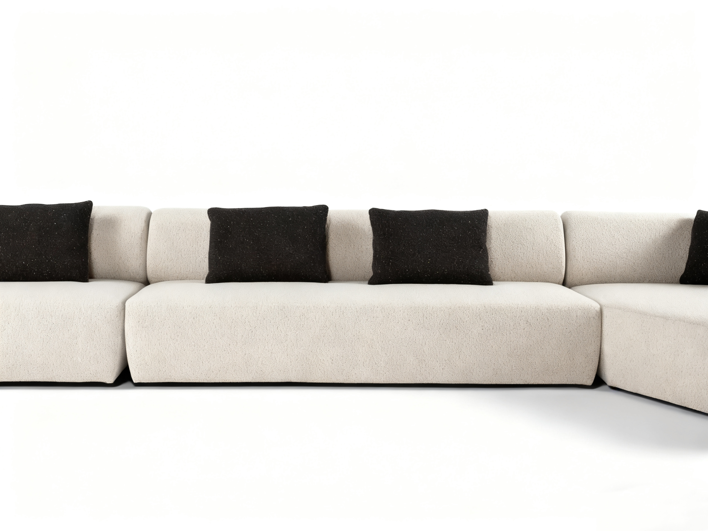 Flowing Modular Sofa with Ergonomic Support and Continuous Decorative Stitch