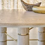 Travertine Round Dining Table with Stacked Cylindrical Legs