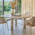 Travertine Round Dining Table with Stacked Cylindrical Legs