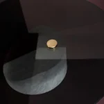 Marble-Accented Black Glass Nesting Side Tables with Geometric Pedestals