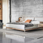 Leather-Strapped Upholstered Bed Modern Industrial Style with Sleek Metal Frame