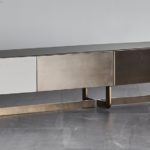 Mixed-Finish TV Console Glass Top Brass Base Contrast Panels Modern Sleek Storage Unit