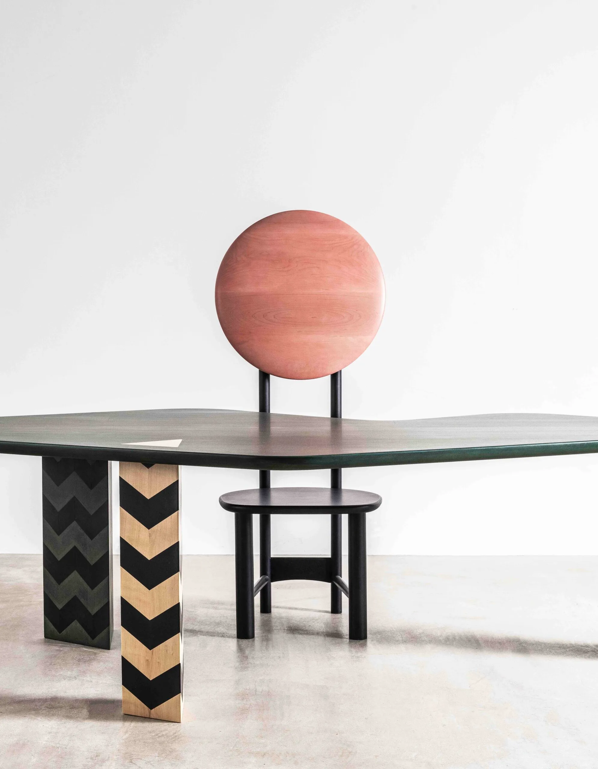 Modern Curved Wood Dining Table with Chevron Pattern Legs