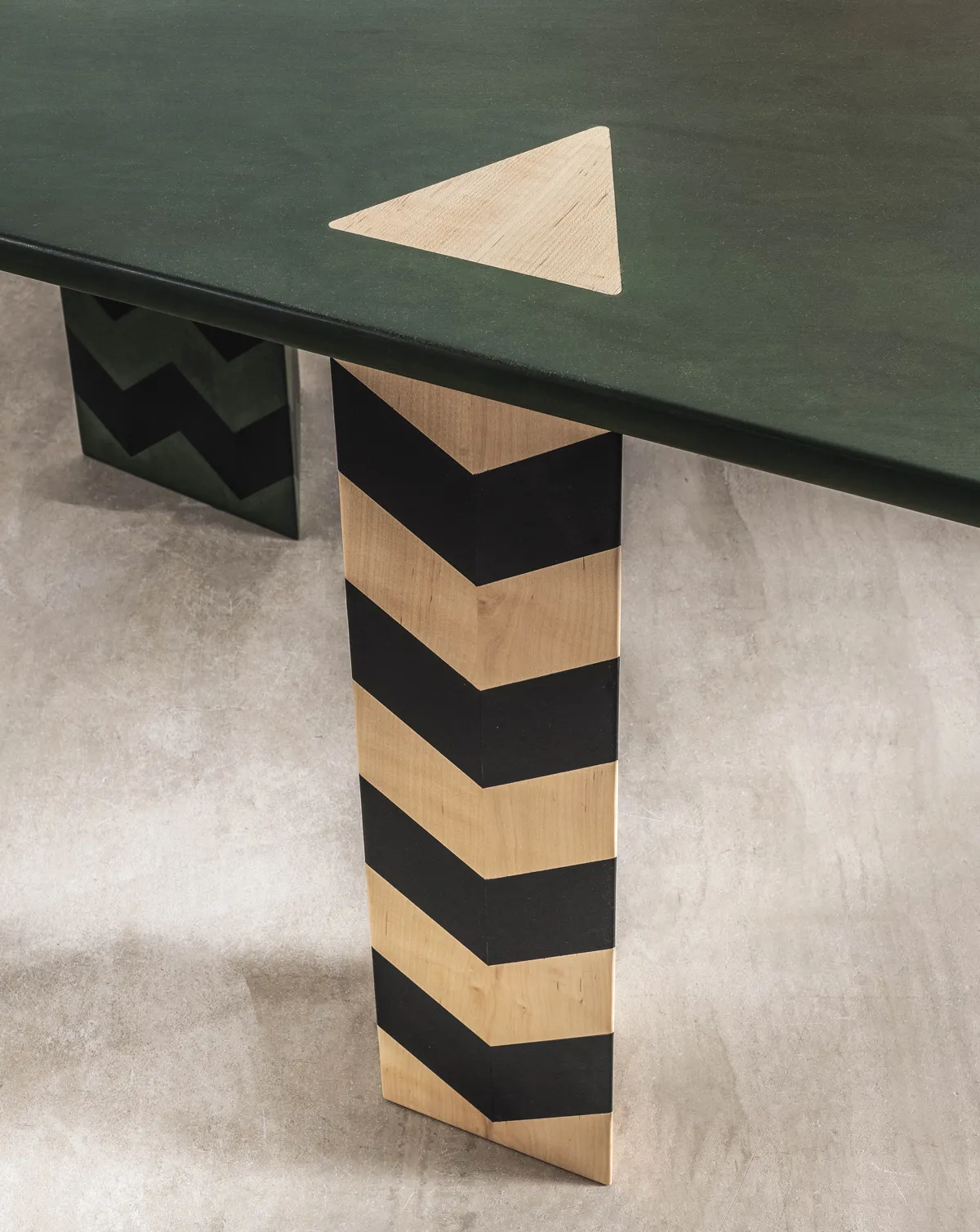 Modern Curved Wood Dining Table with Chevron Pattern Legs
