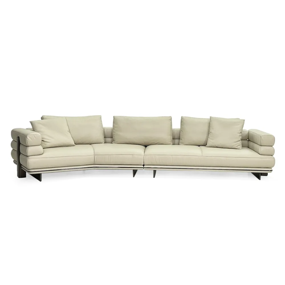 Beige Curved Sofa with Metal Base and Plush Throw Pillows