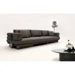 Beige Curved Sofa with Metal Base and Plush Throw Pillows