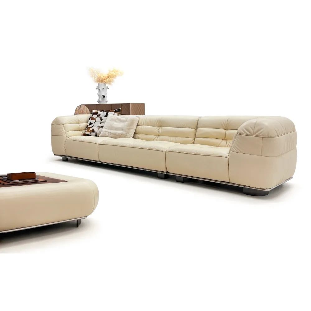 Beige Leather Modular Sofa with Tufted Backrests and Pillows