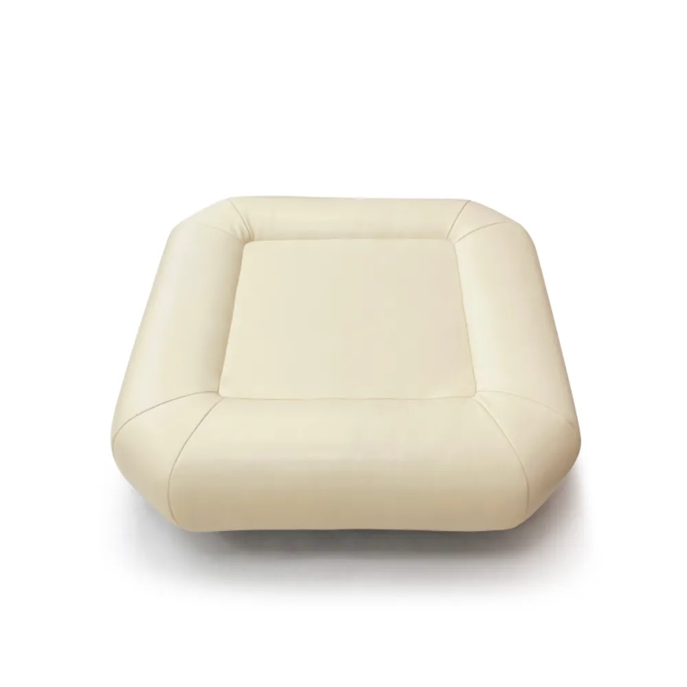 Beige Leather Modular Sofa with Tufted Backrests and Pillows