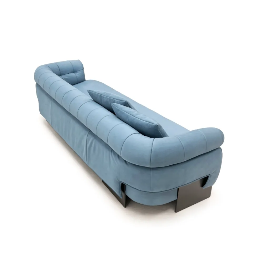 Light Blue Curved Sofa with Tufted Backrest and Metal Base