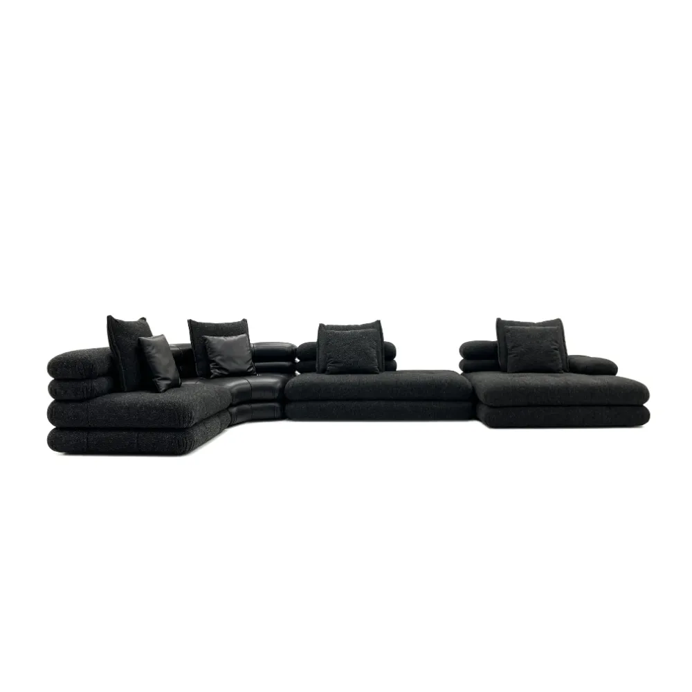 Modern Black Modular Sectional Sofa with Leather Accents and Throw Pillows