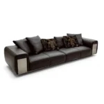 Tan Leather Five Seater Sofa with Metal Accents and Pillows